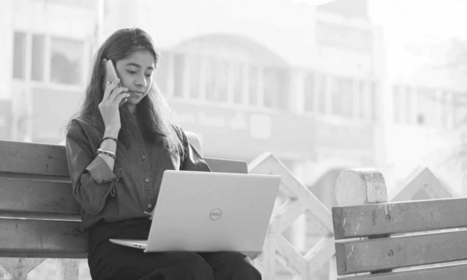 Financial planning workshop session with participants reviewing budgeting exercises